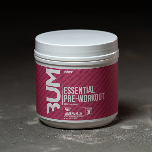 Container of CBUM Essentials Pre Workout in sour watermelon flavor with 30 servings.